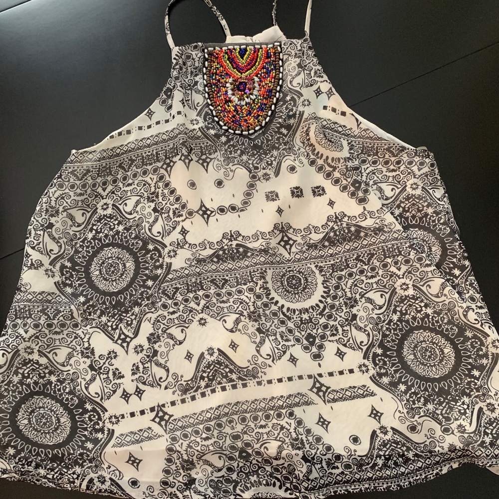 Francesca’s blouse size medium.